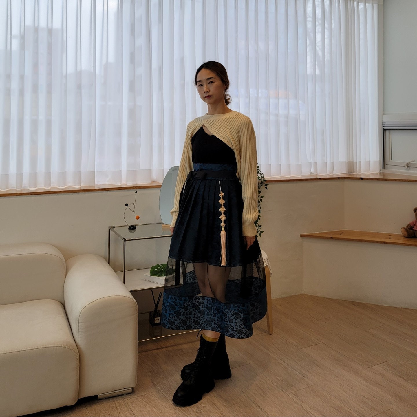 Elegant Layered Mesh High-Low Skirt with Tassel Detail and Patterned Hem - Image 4