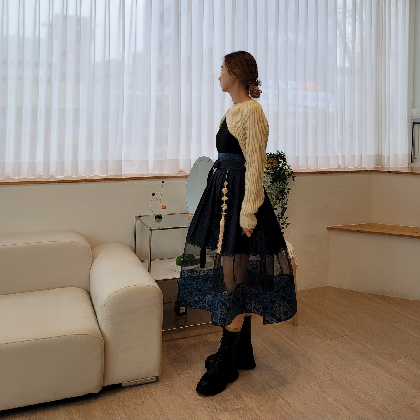 Elegant Layered Mesh High-Low Skirt with Tassel Detail and Patterned Hem - Image 3