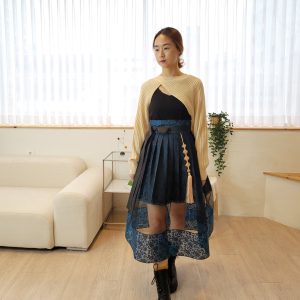 Elegant Layered Mesh High-Low Skirt with Tassel Detail and Patterned Hem